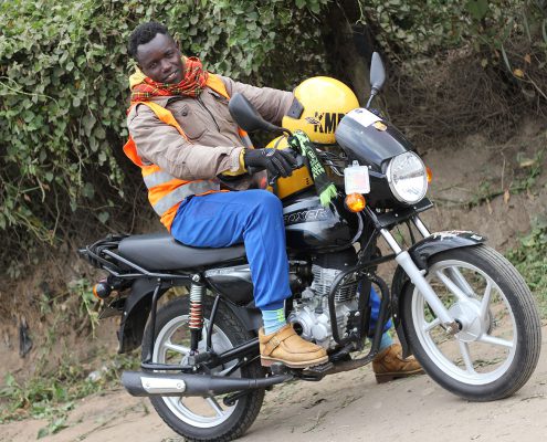 beneficiary with his bike bikes4youth